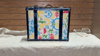 C. Wonder Whimsical Blue and White Decorative Retro Luggage