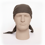 Brown headscarf on a mannequin head against a white background